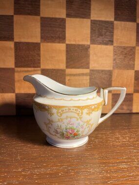 Noritake Pitcher, gold accents show wear